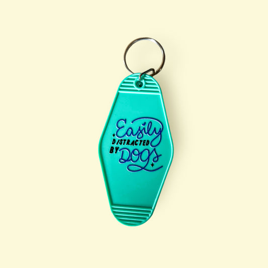 Easily Distracted By Dogs Motel Keychain